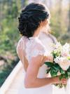 Wedding details - open back lace wedding dress made in San Francisco, hair by Tiffany Cantin, flowers by The Wild Dahlia, Photo by Catherine Threlkeld